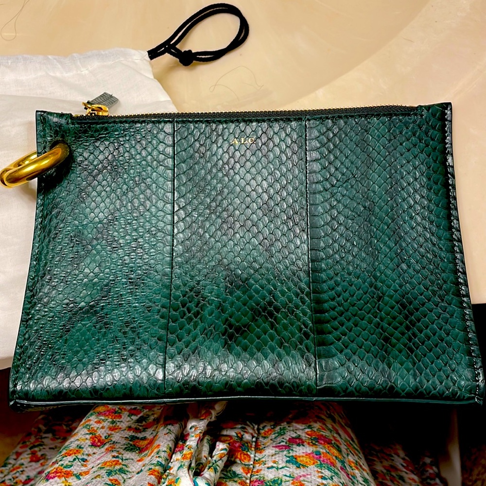 Brand new A.L.C. clutch with authentication and dust bag